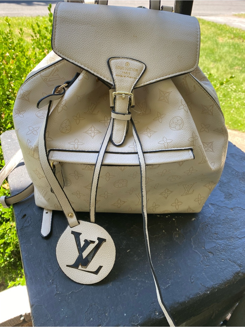 NOT AUTHENTIC Louis Vuitton Ivory Monogram Leather Backpack with LV Tag